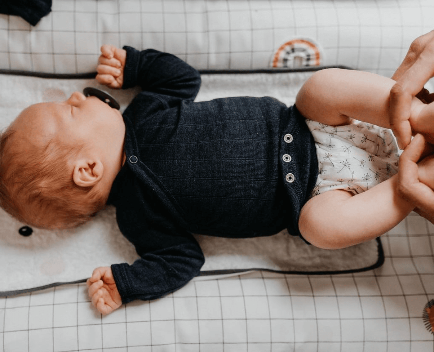 Baby auf dem Wickeltisch