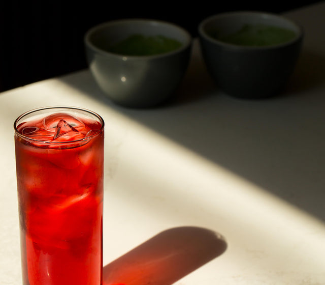 Foto eines Gases mit Rotem Alkoholischem Getränk