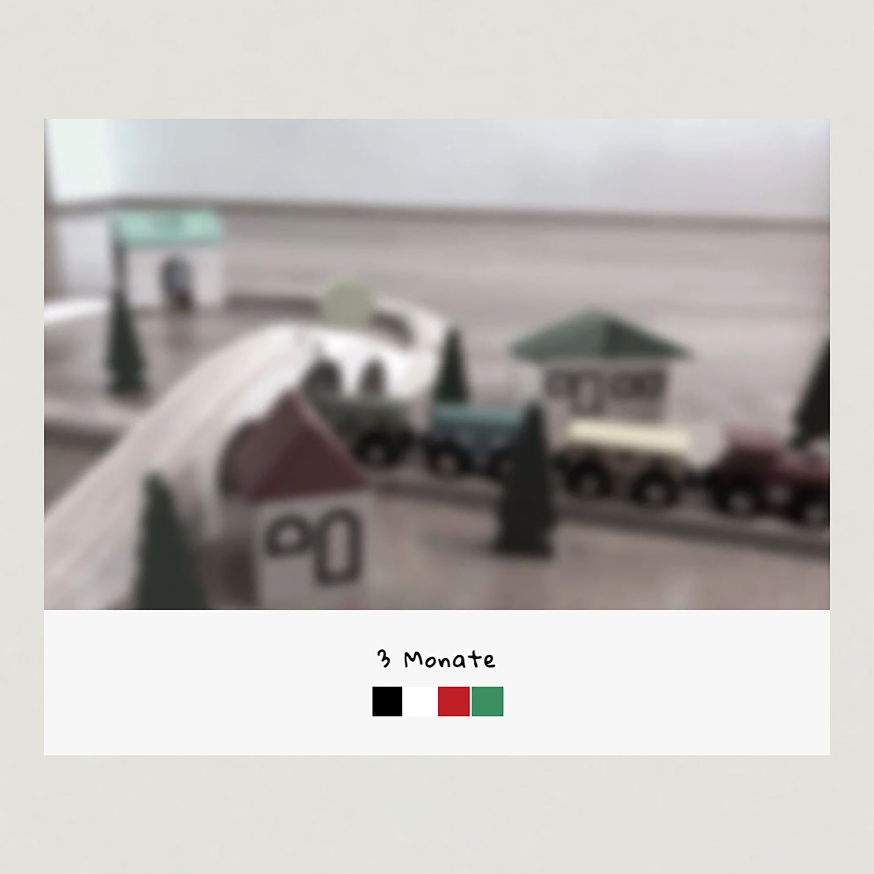 Sehvermögen eines Kindes ab 3 Monaten, Foto einer Holzeisenbahn