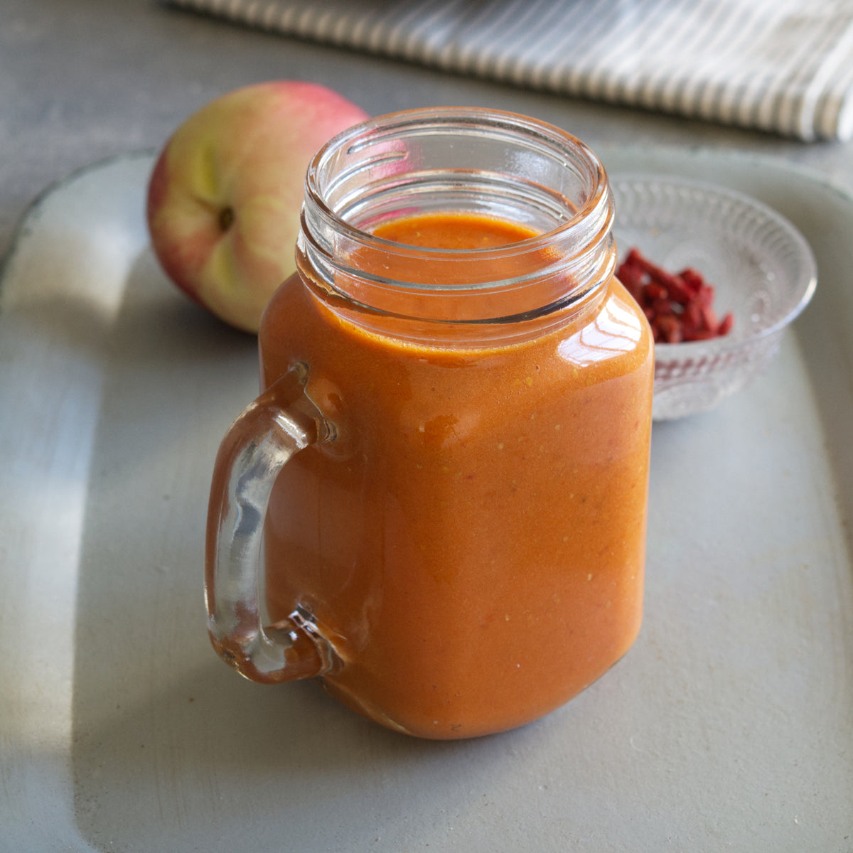 Foto mit orangenem Smoothie