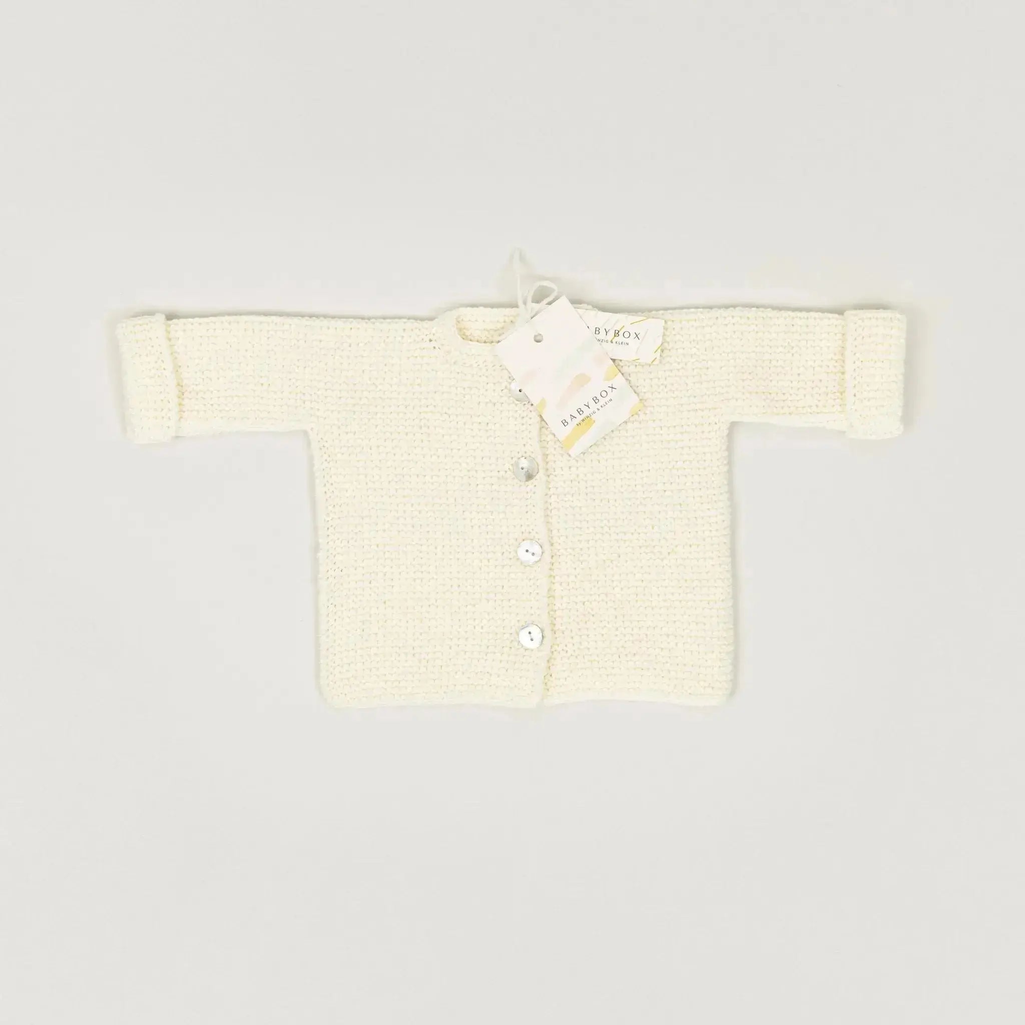 Handgestrickte Merino-Strickjacke in creme