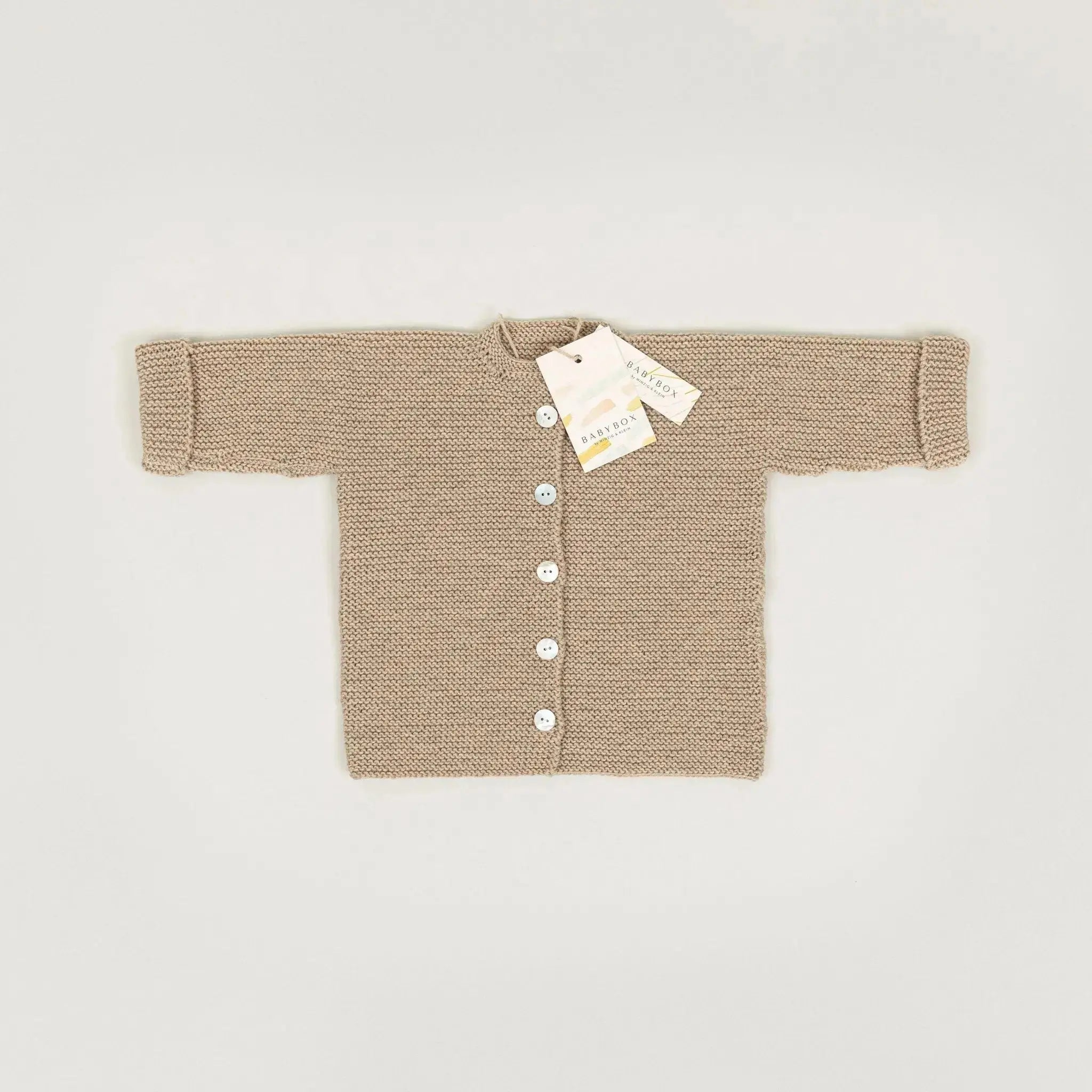 Handgestrickte Merino-Strickjacke in sand