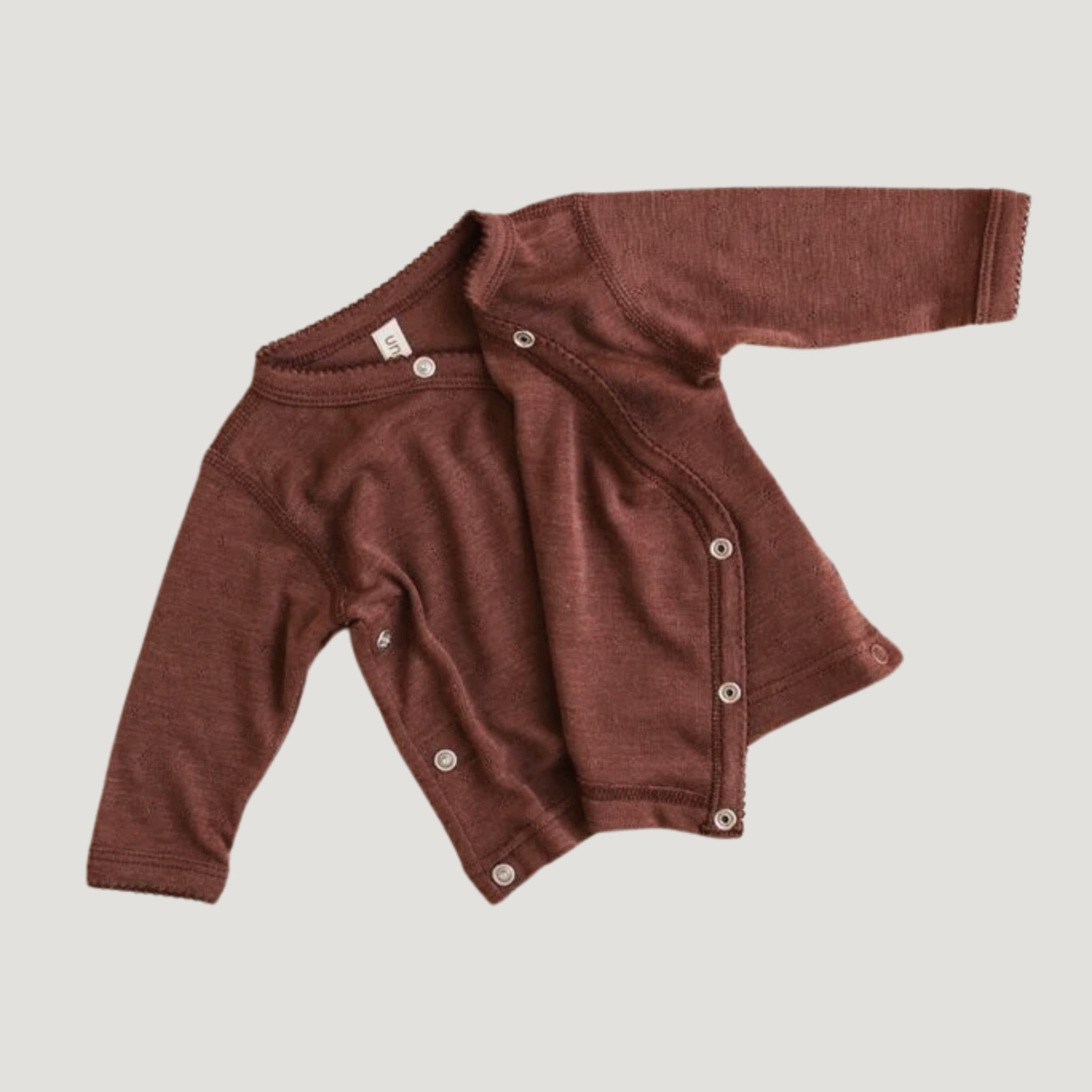 Produktfoto Wickel Cardigan Wolle & Seide Ajour henna-dune Knopfleiste