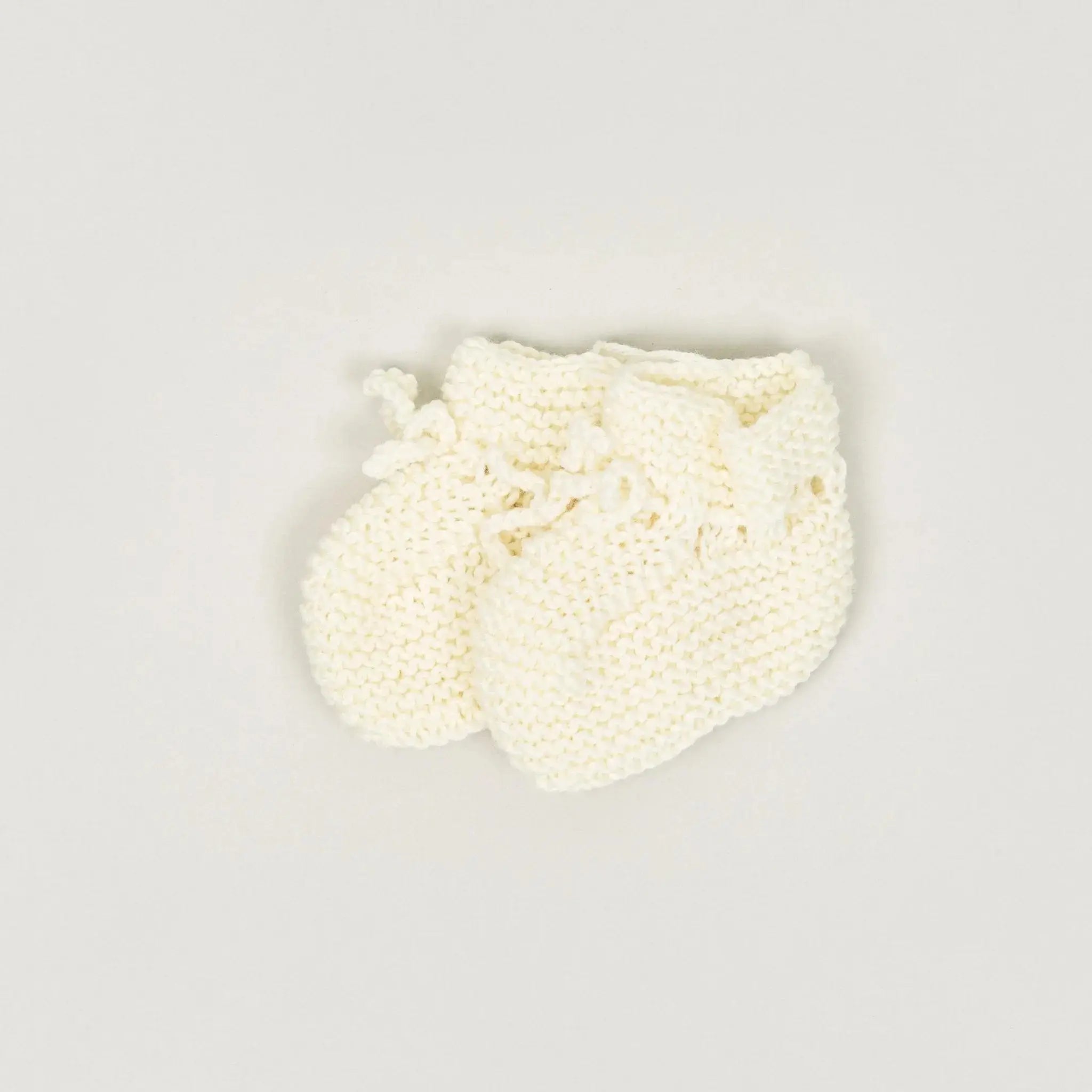 Baby knit booties made of wool for premature babies and multiple births